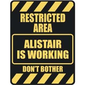   RESTRICTED AREA ALISTAIR IS WORKING  PARKING SIGN