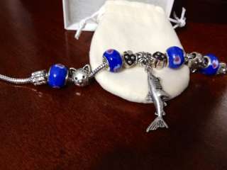   925 CHARM BRACELET WITH MURANO GLASS AND SHARK BEADS.8 INCH.  