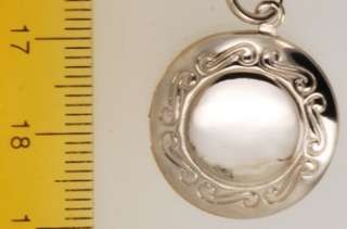 WBM round locket with engraving & Greek key connector  