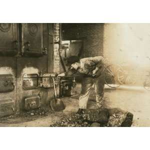 1917 child labor photo Stoking the furnace in the power house. Pauls 