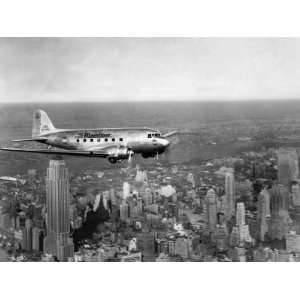 United Airlines Plane Flies over Manhattan, 1937 Premium Poster Print 