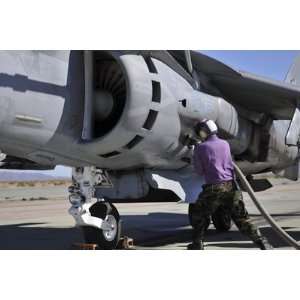  Aviation Fuel Technician Attaches a Fuel Line to an Av 8B 