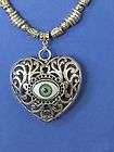 CARVED HEART PENDANT W/GREEN EVIL EYE CHARM & 30BLK LEATHER 