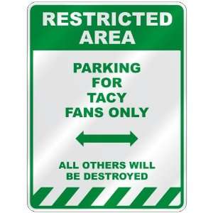   PARKING FOR TACY FANS ONLY  PARKING SIGN