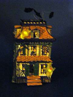 Small Resin Haunted House Lights Up with Scary Sounds  