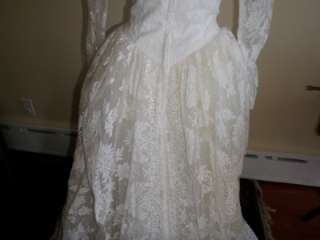 This is a lovely vintage wedding gown. I refer it to as couture since 