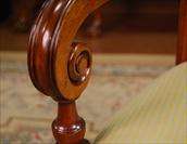   Hand carved solid mahogany backs and frames, webbed seat construction