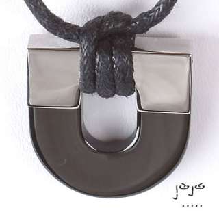   stainless steel and anodized black titanium heavy horse shoe pendant