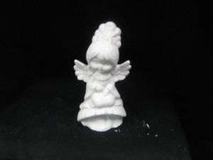 Bisque Ceramic garden angel on a mushroom unpainted  