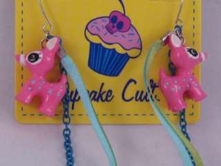 pair of pink deer and ribbon earrings. Brand new on cupcake cult cards 