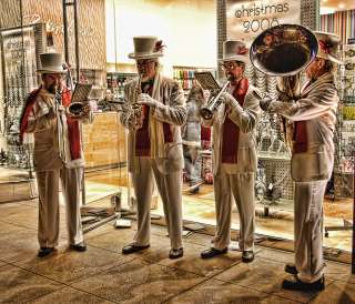 christmas music band performs live at the americana at brand