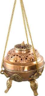 This beautiful copper incense censer features ornate brass accents, it 
