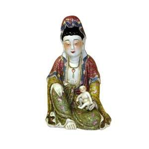   Serene Peaceful Face Porcelain Kwan Statue With Baby