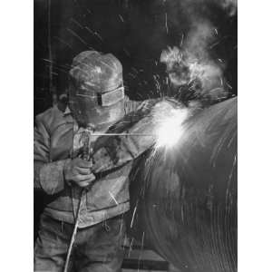  Worker Welding Pipe Used in Natural Gas Pipeline at World 